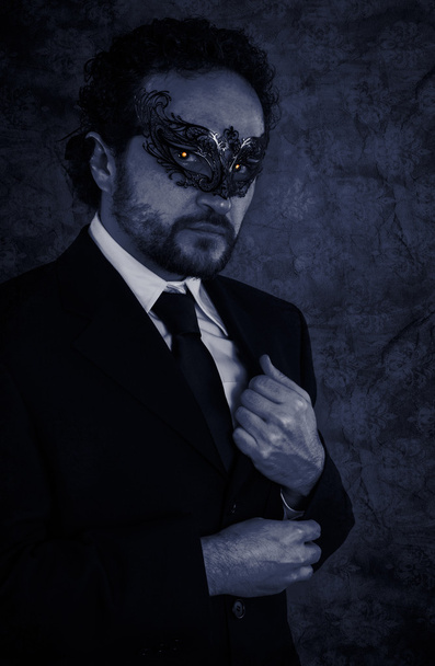 Vampire masked mystery man and elegant black suit - Foto, Imagen