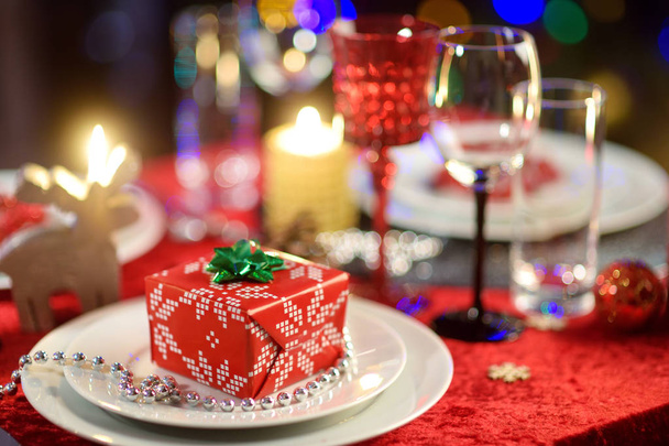 Beautiful table setting for Christmas party or New Year celebration at home - Fotoğraf, Görsel