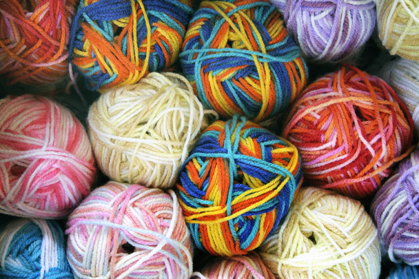 Wool clews closeup with among others rainbow colors - Photo, Image