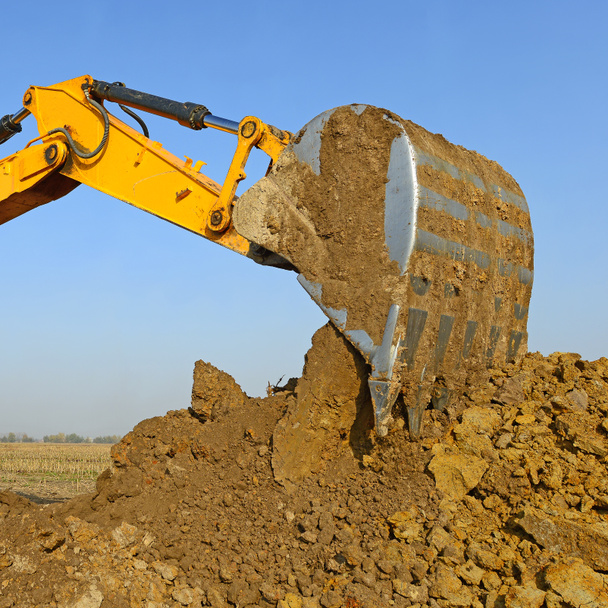excavator digging on the ground  - Photo, Image
