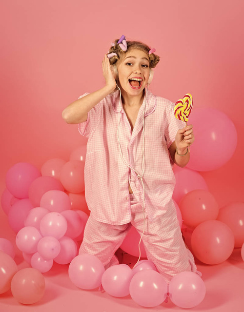 Adorable little girl with lollipop - Fotó, kép
