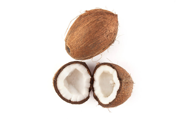 Ripe fresh coconut isolated on white. Food ingredients - Photo, Image