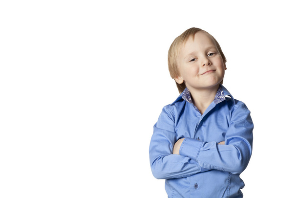 маленький мальчик со смешным лицом на белом
 - Фото, изображение