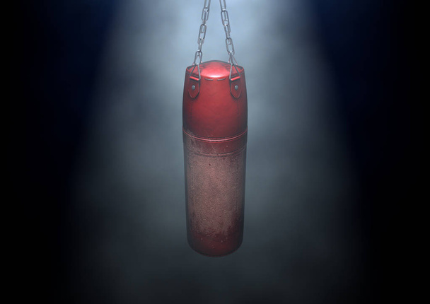 Старая поношенная красная кожаная боксерская груша, висящая на цепях в
 - Фото, изображение