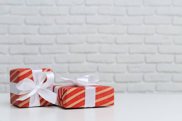 Gift boxes on white table - Zdjęcie, obraz