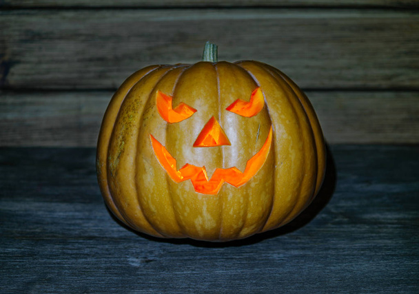 Halloween pumpkin on wooden background - Foto, Imagem