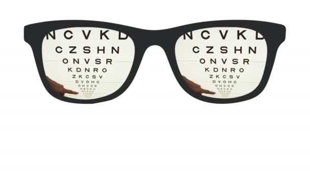 Elölnézet szemüveg lapokkal mutató különböző méretű betűk optikai ellenőrzés - Felvétel, videó