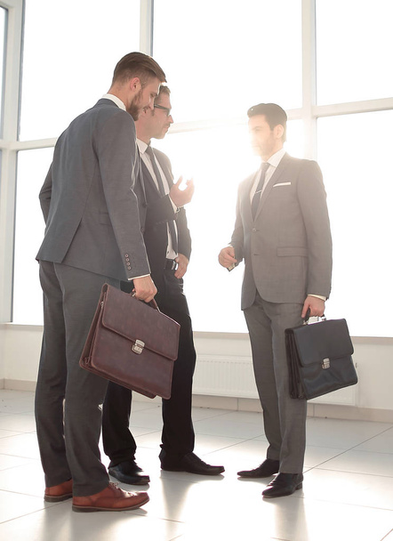A businessman greeting clients - Zdjęcie, obraz