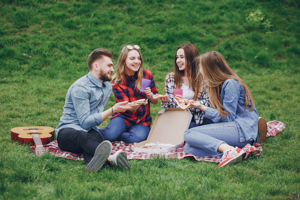Friends on a picnic - Фото, зображення