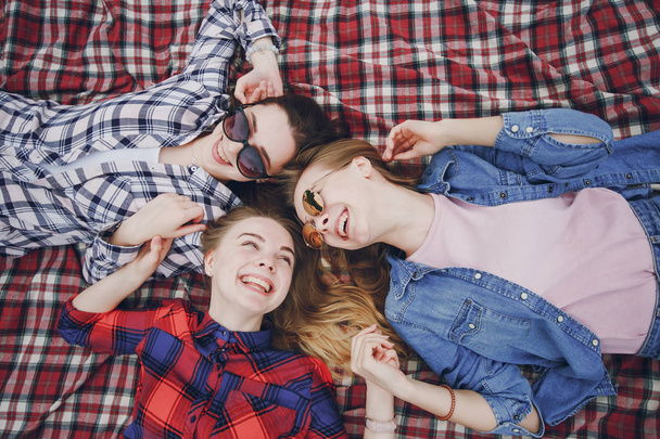 Girls on a picnic - Фото, изображение