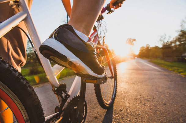 cycling outdoors, close up of the feet on pedal - Foto, immagini