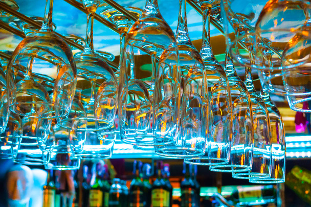 Glasses hanging in a bar - Φωτογραφία, εικόνα