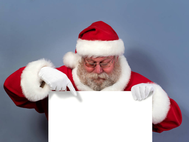 Santa Claus holding white board - Photo, Image