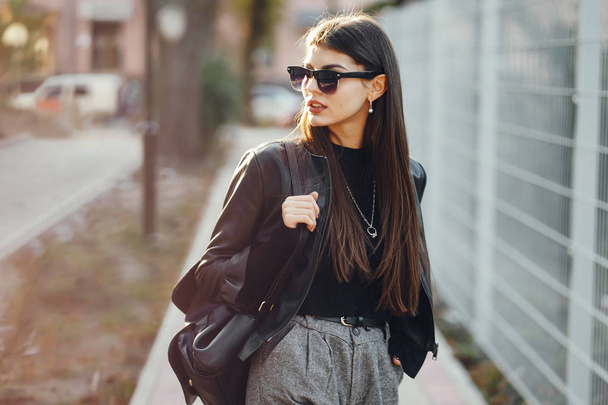 stylish girl walking through the city - Zdjęcie, obraz