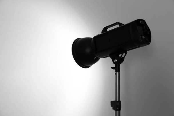 Studio lighting against white background. Professional photo equipment - Photo, Image