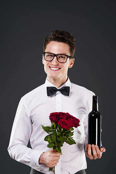 Man with roses - Фото, изображение