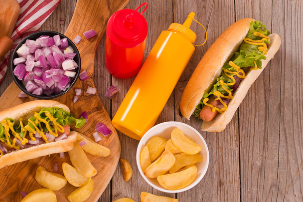 Hot dogs on cutting board. - Photo, Image