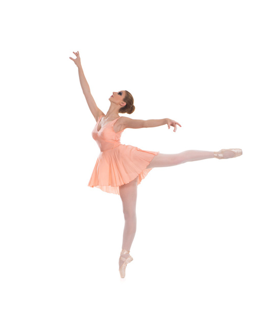 Young beautiful ballet dancer isolated over white background - 写真・画像
