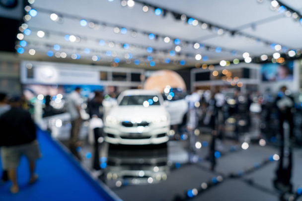 Blurred background of new car displayed in showroom. Car dealer. - Photo, Image