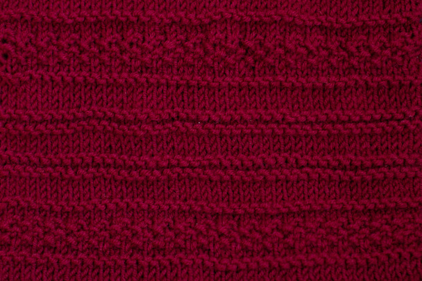 Red handmade knitted linen with stripes - Photo, Image