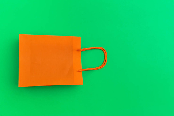 paper shopping bag on colorful background - Valokuva, kuva