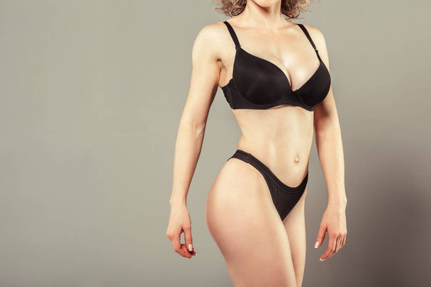 close up of Beautiful slim woman body in underwear - Fotó, kép