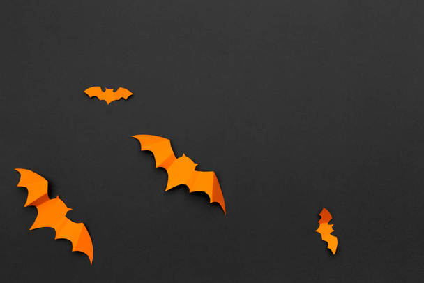 halloween and decoration concept - paper bats flying - 写真・画像