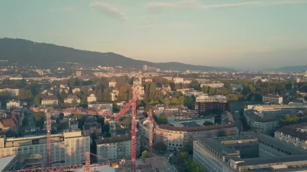 ZURICH, SWITZERLAND - SEPTEMBER 21, 2018. Aerial view of a construction site and cityscape - 映像、動画