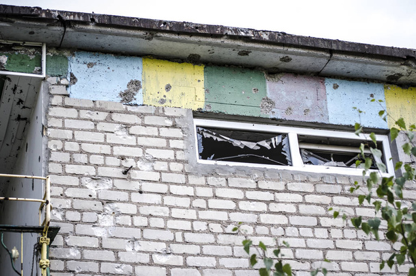 The war in Ukraine. Settlement Shyrokyne, Donetsk region. September 2018. Buildings destroyed as a result of military actions of the Russian invaders in 2014-2018. - Photo, Image