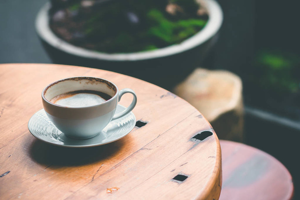 close up hot latte on the wooden table, empty cafe, stock photographer - Zdjęcie, obraz
