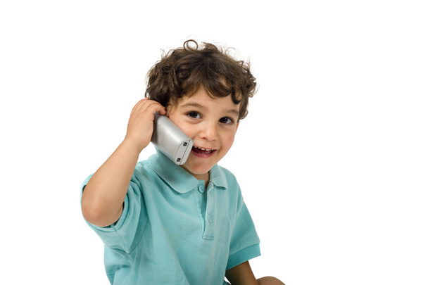 Nuori poika puhuu puhelimessa - Valokuva, kuva