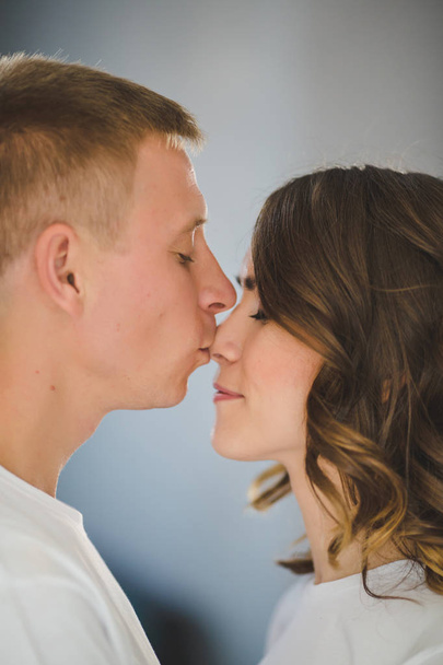 Portrait of beautiful young couple in love - Foto, imagen
