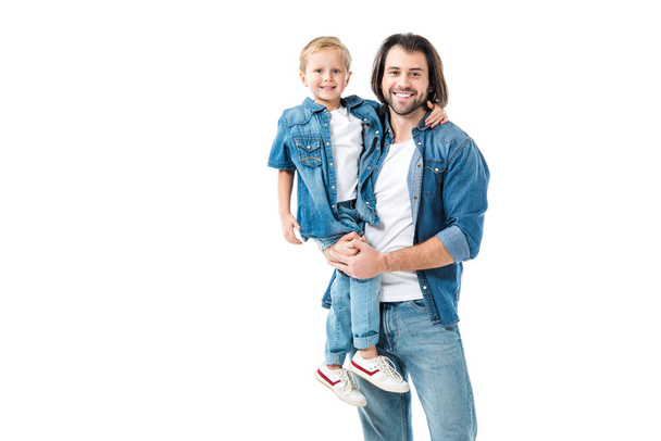 Father and son hugging and smiling at camera isolated on white - Valokuva, kuva