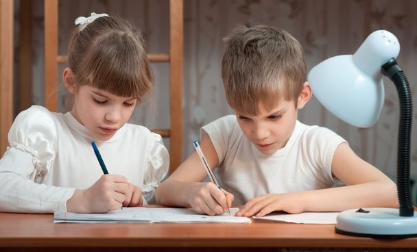 children draw in a notebook - Φωτογραφία, εικόνα