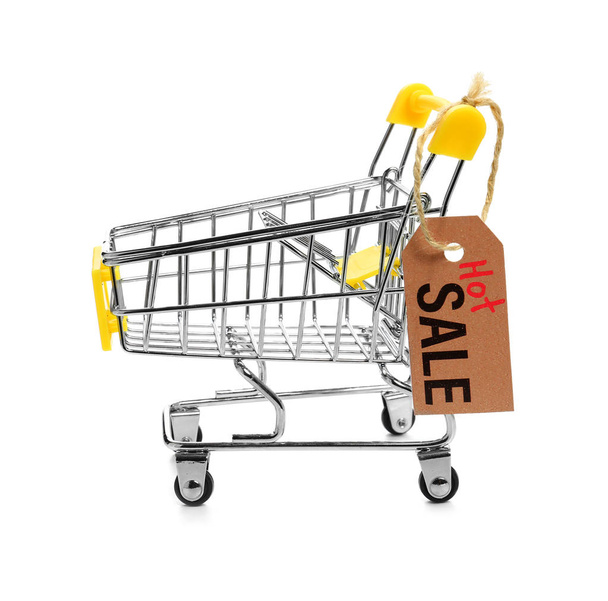 Empty shopping cart on white background. Hot sale concept - Фото, зображення