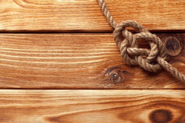 ship rope at wooden background - Foto, Imagem