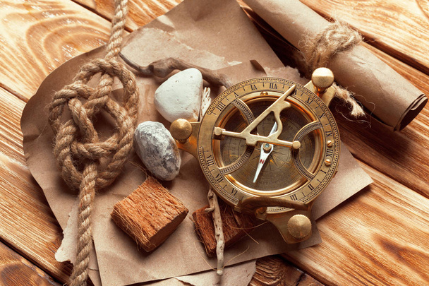 Close up of compass and ship rope - Foto, imagen