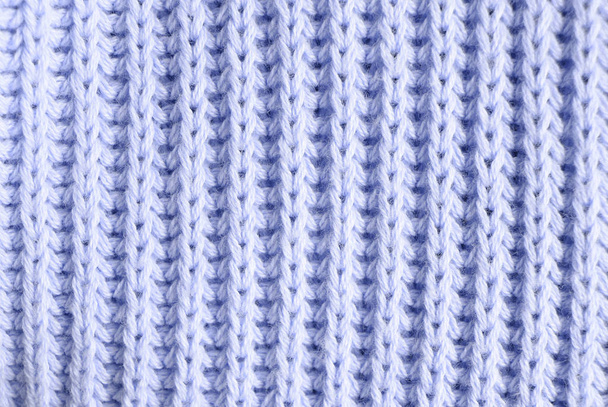 Текстура розового трикотажного свитера крупным планом. Вид сверху. Текстильная одежда
. - Фото, изображение