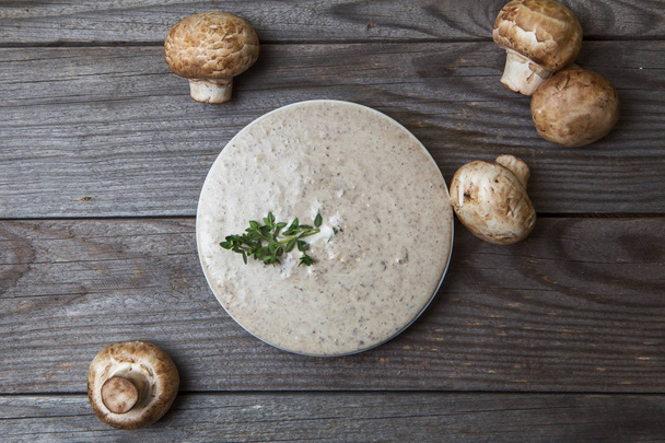 A bowl of creamy mushroom soup top view - Fotoğraf, Görsel