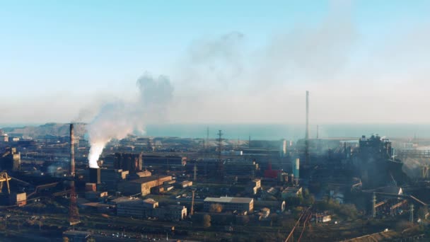 Metallurgical plant with a bird's-eye view. Evening time. Environmental pollution. - Footage, Video