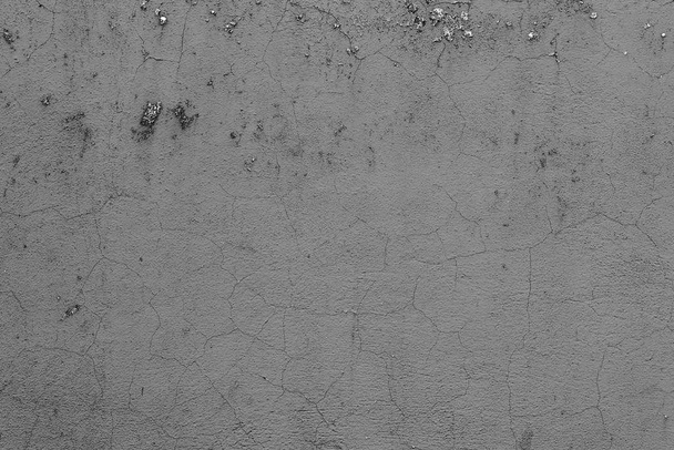 Wall fragment with scratches and cracks. It can be used as a background - Photo, Image