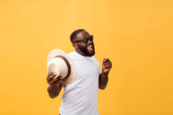 Young black man top dancing isolated on a yellow background. - Foto, Imagem