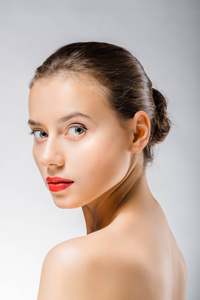 young beautiful woman with red lips looking at camera  - Fotografie, Obrázek