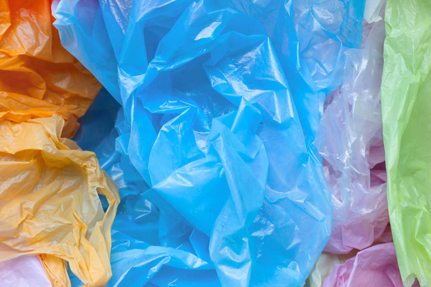 Colorful plastic bags for background. - Фото, зображення