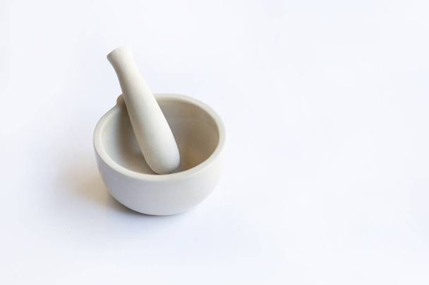 Mortar and pestle  on white - Photo, Image