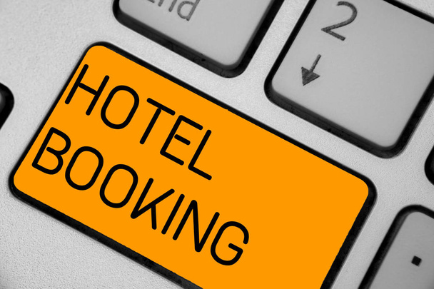 Handwriting text Hotel Booking. Concept meaning Online Reservations Presidential Suite De Luxe Hospitality Keyboard orange key Intention create computer computing reflection document. - Photo, Image