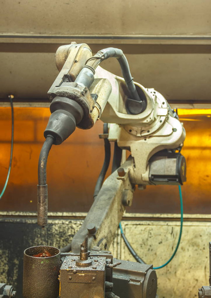 Csapat az autóipari alkatrészek iparban hegesztő robotok - Fotó, kép