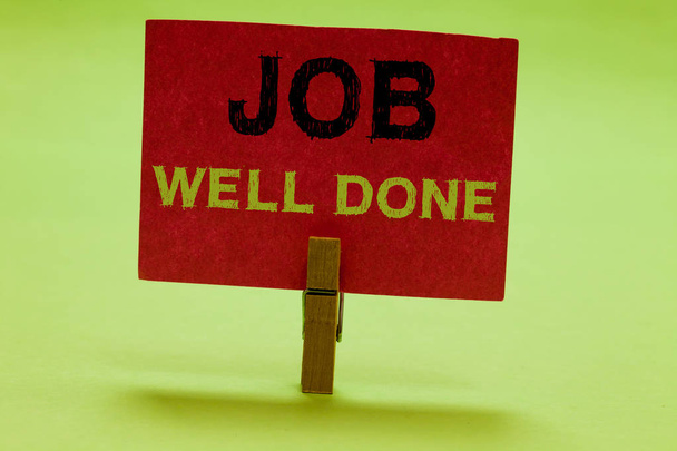 Text sign showing Job Well Done. Conceptual photo Well Performed You did it Cheers Approval Par Accomplished Clothespin holding red paper important communicating messages ideas. - Photo, Image