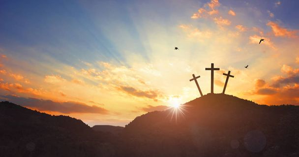 Christmas concept: Crucifixion Of Jesus Christ Cross At Sunset - Photo, Image