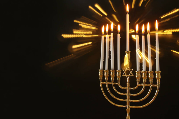 image of jewish holiday Hanukkah background with menorah (traditional candelabra) and candles - Zdjęcie, obraz